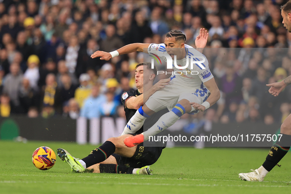 Jimmy Dunne (QPR) tackles Mateo Joseph (Leeds United) during the Sky Bet Championship match between Leeds United and Queens Park Rangers at...