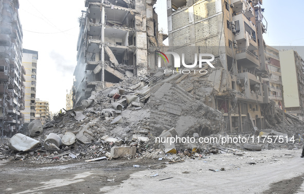 A heavily damaged building, hit by an Israeli strike, stands during a media tour organized by the Hezbollah press office to the sites of ove...