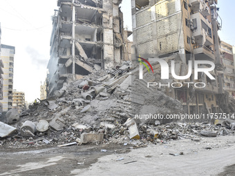 A heavily damaged building, hit by an Israeli strike, stands during a media tour organized by the Hezbollah press office to the sites of ove...