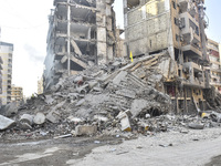 A heavily damaged building, hit by an Israeli strike, stands during a media tour organized by the Hezbollah press office to the sites of ove...