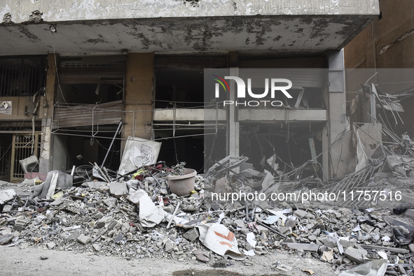 A heavily damaged building, hit by an Israeli strike, stands during a media tour organized by the Hezbollah press office to the sites of ove...