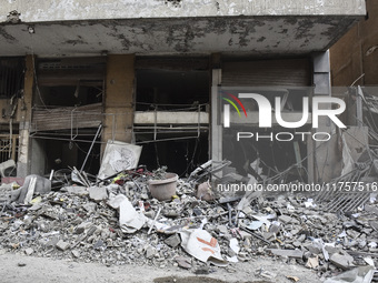 A heavily damaged building, hit by an Israeli strike, stands during a media tour organized by the Hezbollah press office to the sites of ove...