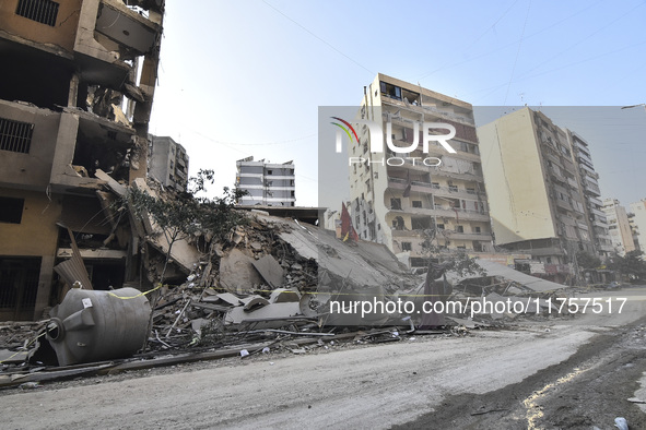 A heavily damaged building, hit by an Israeli strike, stands during a media tour organized by the Hezbollah press office to the sites of ove...