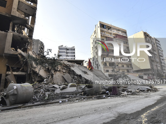 A heavily damaged building, hit by an Israeli strike, stands during a media tour organized by the Hezbollah press office to the sites of ove...