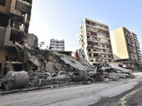 A heavily damaged building, hit by an Israeli strike, stands during a media tour organized by the Hezbollah press office to the sites of ove...