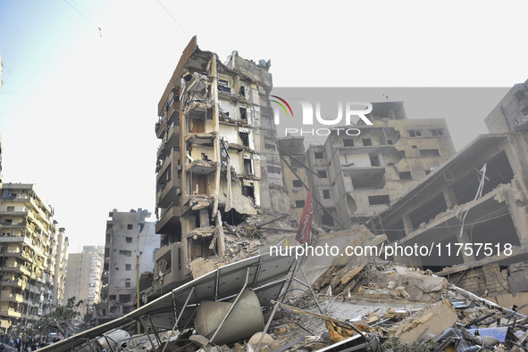 A heavily damaged building, hit by an Israeli strike, stands during a media tour organized by the Hezbollah press office to the sites of ove...