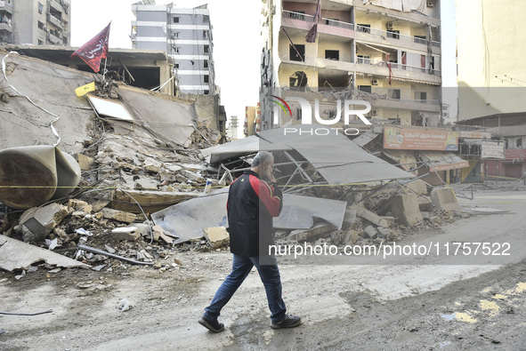 A heavily damaged building, hit by an Israeli strike, stands during a media tour organized by the Hezbollah press office to the sites of ove...