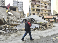 A heavily damaged building, hit by an Israeli strike, stands during a media tour organized by the Hezbollah press office to the sites of ove...