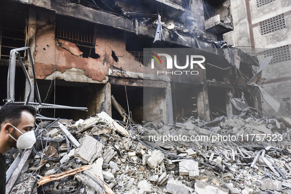 A heavily damaged building, hit by an Israeli strike, stands during a media tour organized by the Hezbollah press office to the sites of ove...