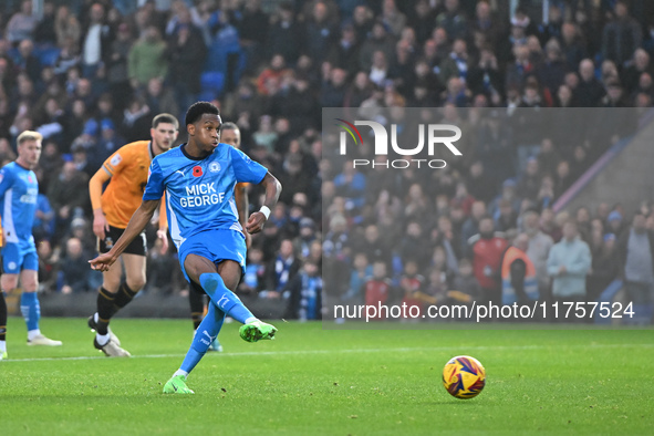 Malik Mothersille (7 Peterborough United) scores from the penalty spot to make it 4-0 during the Sky Bet League 1 match between Peterborough...