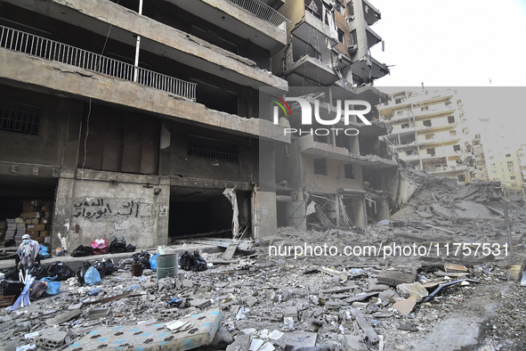 A heavily damaged building, hit by an Israeli strike, stands during a media tour organized by the Hezbollah press office to the sites of ove...