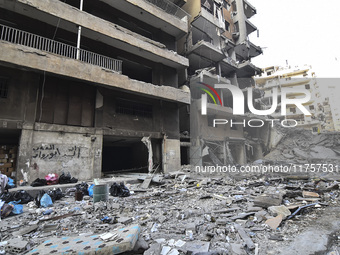 A heavily damaged building, hit by an Israeli strike, stands during a media tour organized by the Hezbollah press office to the sites of ove...