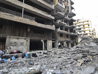 A heavily damaged building, hit by an Israeli strike, stands during a media tour organized by the Hezbollah press office to the sites of ove...