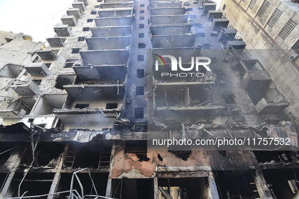 A heavily damaged building, hit by an Israeli strike, stands during a media tour organized by the Hezbollah press office to the sites of ove...