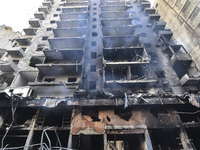 A heavily damaged building, hit by an Israeli strike, stands during a media tour organized by the Hezbollah press office to the sites of ove...