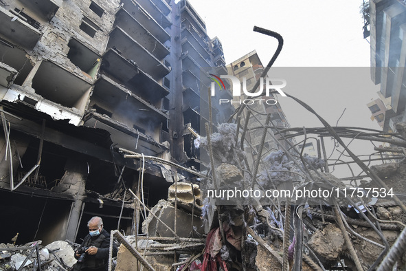 A heavily damaged building, hit by an Israeli strike, stands during a media tour organized by the Hezbollah press office to the sites of ove...