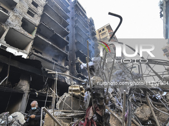 A heavily damaged building, hit by an Israeli strike, stands during a media tour organized by the Hezbollah press office to the sites of ove...