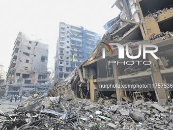 A heavily damaged building, hit by an Israeli strike, stands during a media tour organized by the Hezbollah press office to the sites of ove...