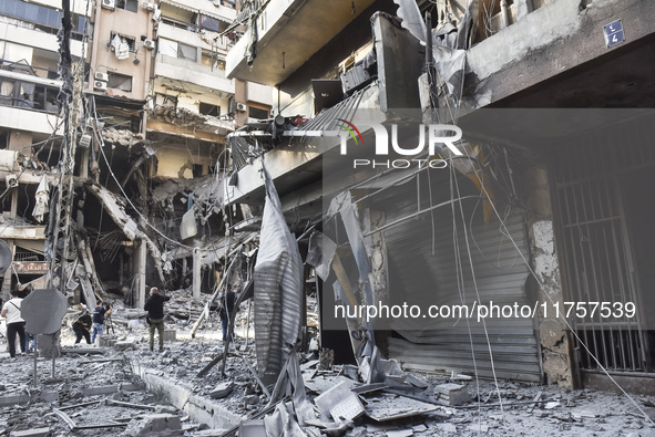 A heavily damaged building, hit by an Israeli strike, stands during a media tour organized by the Hezbollah press office to the sites of ove...