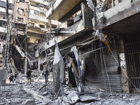 A heavily damaged building, hit by an Israeli strike, stands during a media tour organized by the Hezbollah press office to the sites of ove...