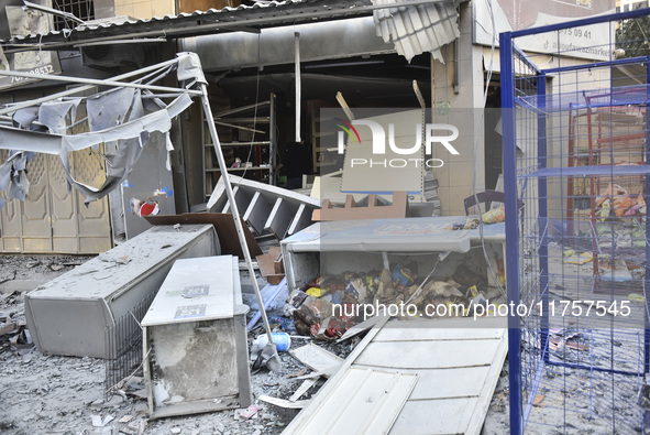 A heavily damaged building, hit by an Israeli strike, stands during a media tour organized by the Hezbollah press office to the sites of ove...