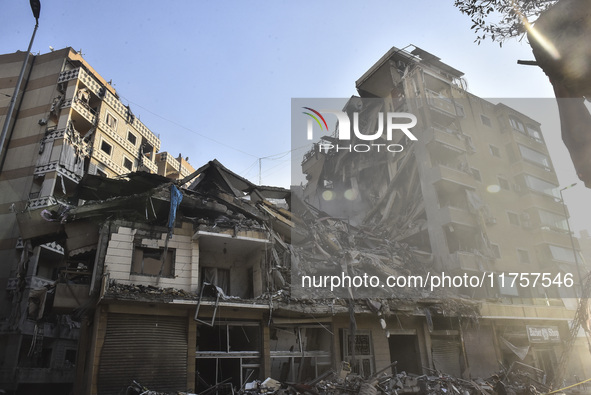 A heavily damaged building, hit by an Israeli strike, stands during a media tour organized by the Hezbollah press office to the sites of ove...