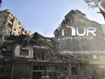 A heavily damaged building, hit by an Israeli strike, stands during a media tour organized by the Hezbollah press office to the sites of ove...