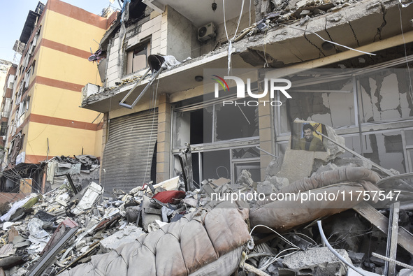 A heavily damaged building, hit by an Israeli strike, stands during a media tour organized by the Hezbollah press office to the sites of ove...