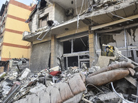 A heavily damaged building, hit by an Israeli strike, stands during a media tour organized by the Hezbollah press office to the sites of ove...