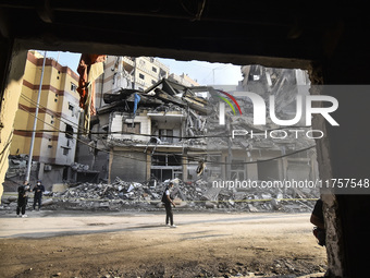 A heavily damaged building, hit by an Israeli strike, stands during a media tour organized by the Hezbollah press office to the sites of ove...