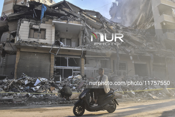 A heavily damaged building, hit by an Israeli strike, stands during a media tour organized by the Hezbollah press office to the sites of ove...