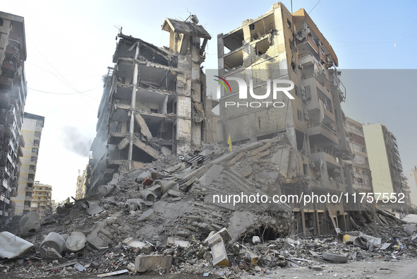 A heavily damaged building, hit by an Israeli strike, stands during a media tour organized by the Hezbollah press office to the sites of ove...