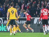 Tyler Dibling, number 33 of Southampton, is in attacking action during the Premier League match between Wolverhampton Wanderers and Southamp...