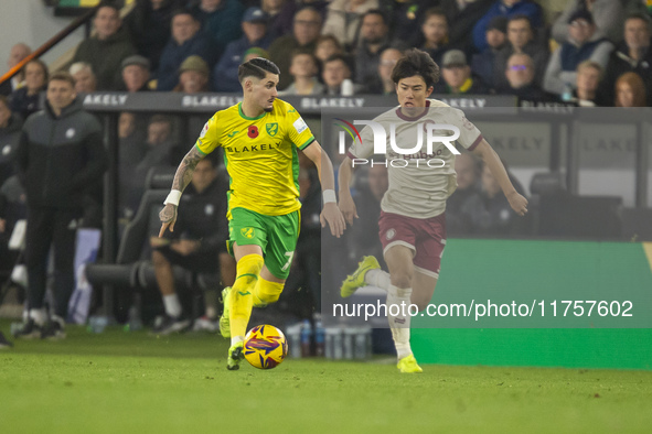 Borja Sainz of Norwich City is pressured by Yu Hirakawa of Bristol City during the Sky Bet Championship match between Norwich City and Brist...