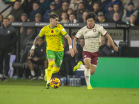 Borja Sainz of Norwich City is pressured by Yu Hirakawa of Bristol City during the Sky Bet Championship match between Norwich City and Brist...