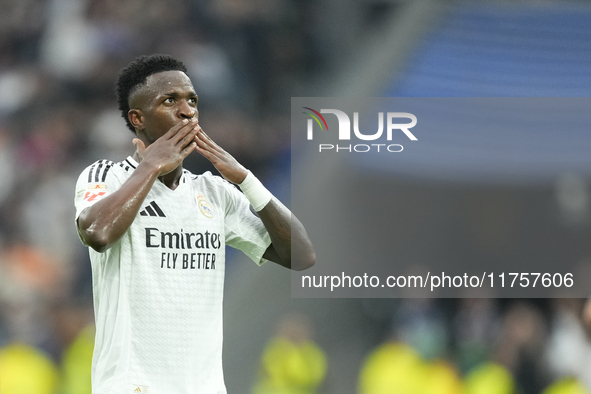 Vinicius Junior left winger of Real Madrid and Brazil third goal during the La Liga match between Real Madrid CF and CA Osasuna at Estadio S...