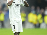 Vinicius Junior left winger of Real Madrid and Brazil third goal during the La Liga match between Real Madrid CF and CA Osasuna at Estadio S...