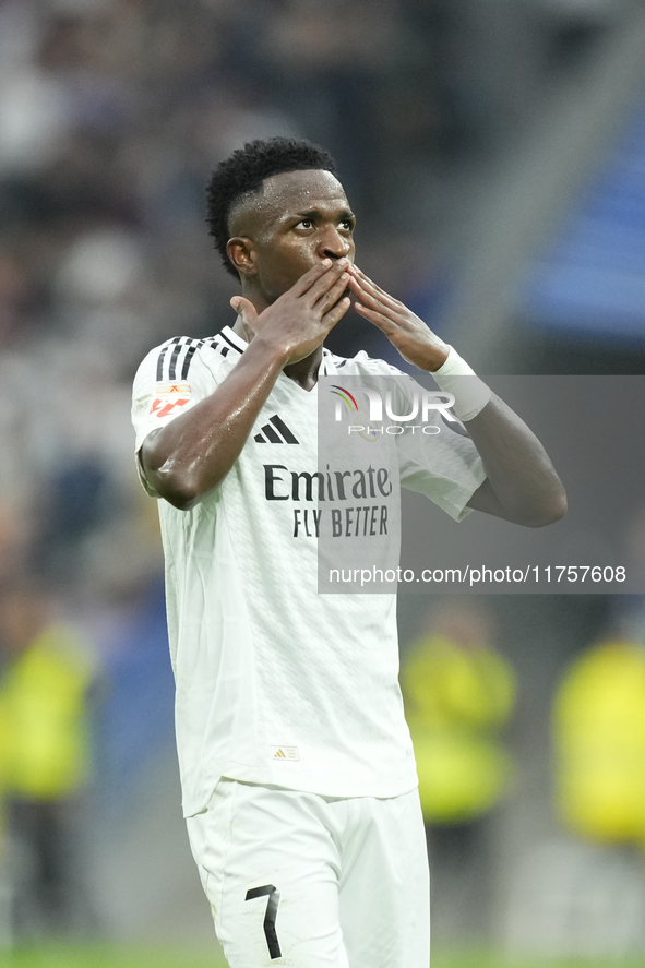 Vinicius Junior left winger of Real Madrid and Brazil third goal during the La Liga match between Real Madrid CF and CA Osasuna at Estadio S...