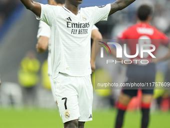 Vinicius Junior left winger of Real Madrid and Brazil third goal during the La Liga match between Real Madrid CF and CA Osasuna at Estadio S...