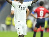 Vinicius Junior left winger of Real Madrid and Brazil third goal during the La Liga match between Real Madrid CF and CA Osasuna at Estadio S...