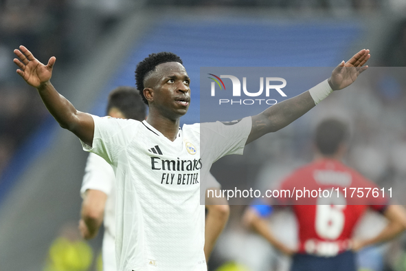 Vinicius Junior left winger of Real Madrid and Brazil third goal during the La Liga match between Real Madrid CF and CA Osasuna at Estadio S...