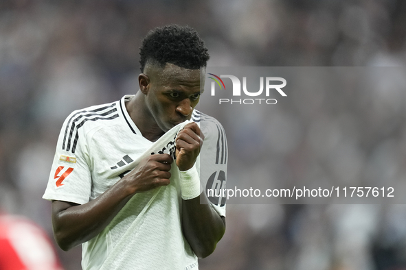 Vinicius Junior left winger of Real Madrid and Brazil third goal during the La Liga match between Real Madrid CF and CA Osasuna at Estadio S...