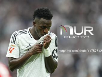 Vinicius Junior left winger of Real Madrid and Brazil third goal during the La Liga match between Real Madrid CF and CA Osasuna at Estadio S...