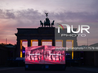 Evening screening in front of the Brandenburg Gate during the 35th anniversary of the fall of the Berlin Wall. Berlin, Germany on 9 November...