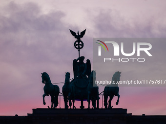 Sunset at the Brandenburg Gate during the 35th anniversary of the fall of the Berlin Wall. Berlin, Germany on 9 November, 2024. (