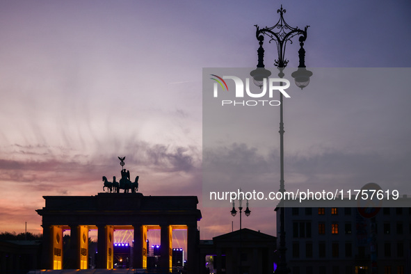 Sunset at the Brandenburg Gate during the 35th anniversary of the fall of the Berlin Wall. Berlin, Germany on 9 November, 2024. 