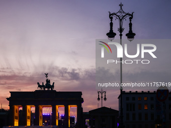 Sunset at the Brandenburg Gate during the 35th anniversary of the fall of the Berlin Wall. Berlin, Germany on 9 November, 2024. (