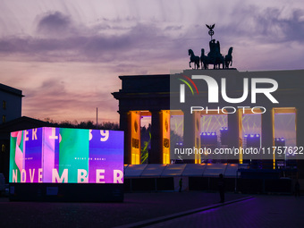 Evening screening in front of the Brandenburg Gate during the 35th anniversary of the fall of the Berlin Wall. Berlin, Germany on 9 November...