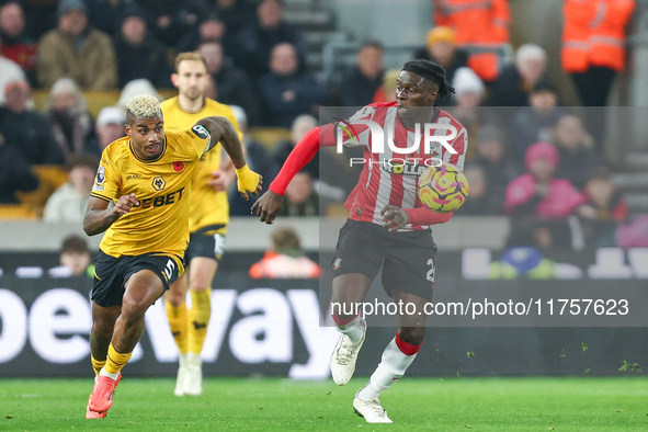 Mario Lemina of Wolves and Lesley Ugochukwu of Southampton fight for possession during the Premier League match between Wolverhampton Wander...