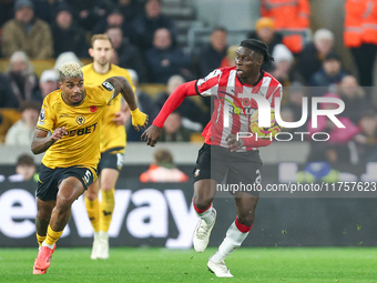 Mario Lemina of Wolves and Lesley Ugochukwu of Southampton fight for possession during the Premier League match between Wolverhampton Wander...